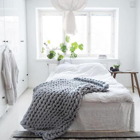 Couverture, plaid en grosses mailles