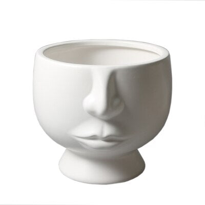 Cache-pot visage