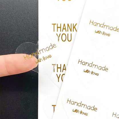 Lot de 100 autocollants transparents, coeur "handmade with love" et "thank you"
