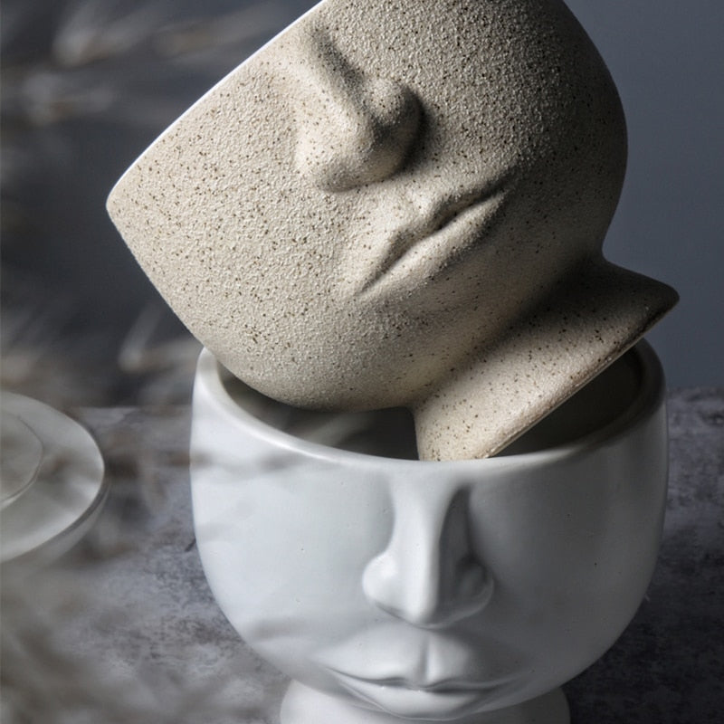 Cache-pot visage