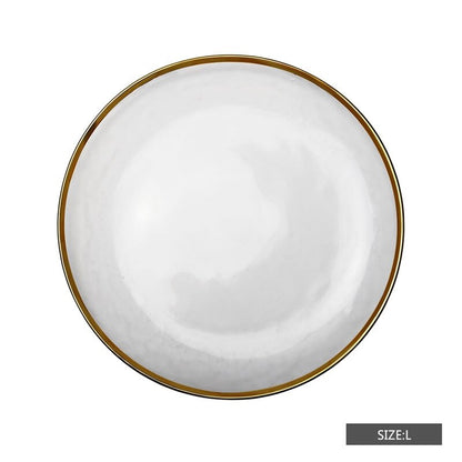 Assiette dorée en verre
