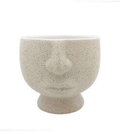 Cache-pot visage
