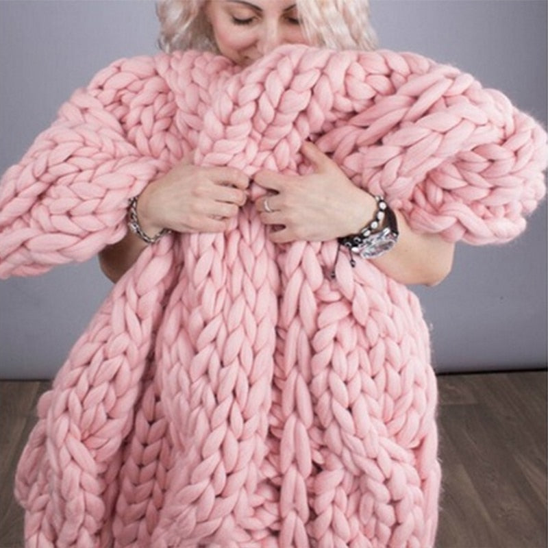Couverture, plaid en grosses mailles