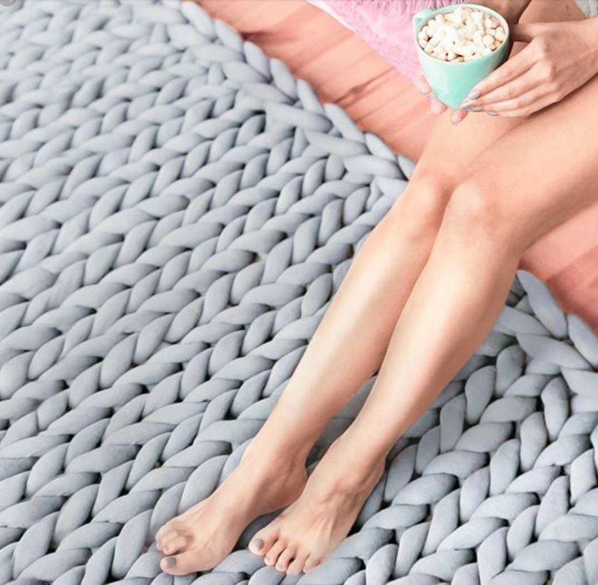 Couverture, plaid en grosses mailles