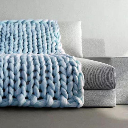 Couverture, plaid en grosses mailles